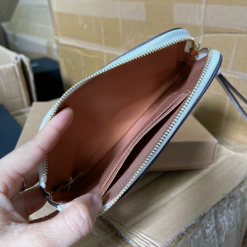 Ví coach đeo cổ tay siêu cưng