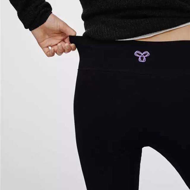 Quần legging Tna