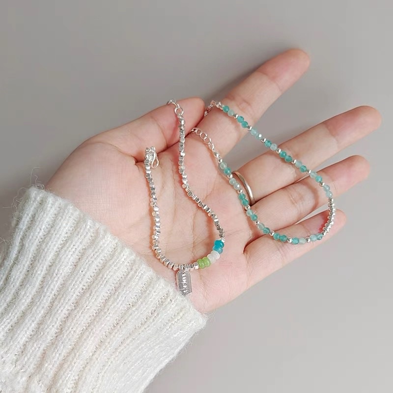 Vòng tay hạt cườm phối charm pastel xinh xắn