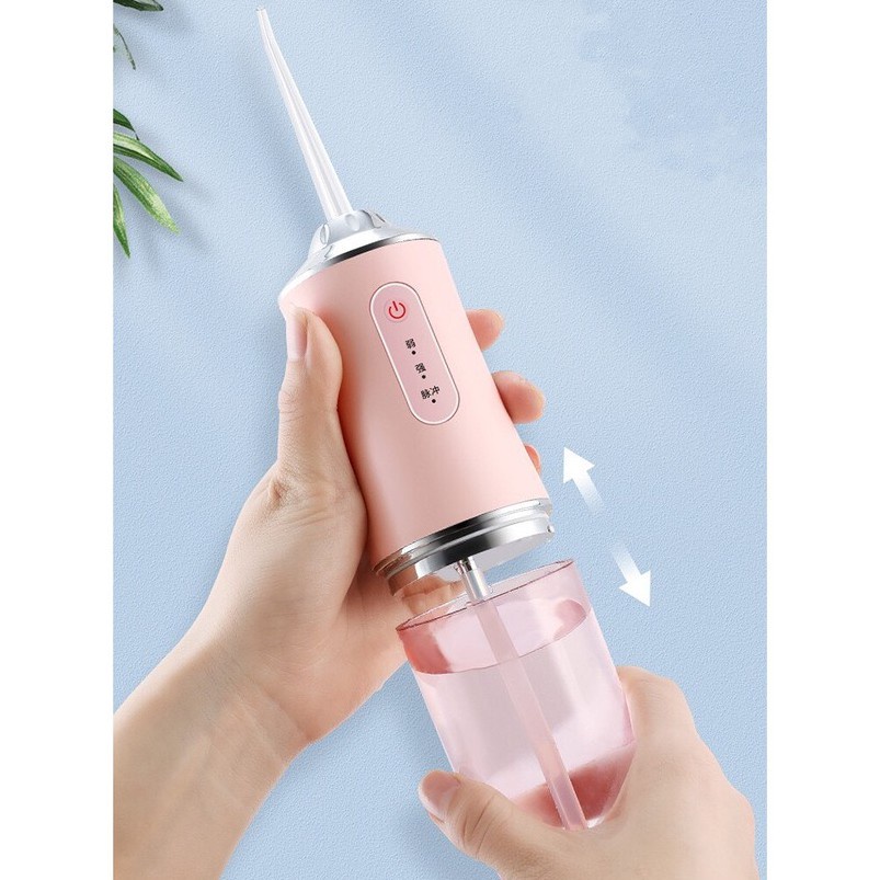 Máy Tăm Nước Oral Irrigator ( Kèm 4 đầu tăm) Bảo hành 3 tháng