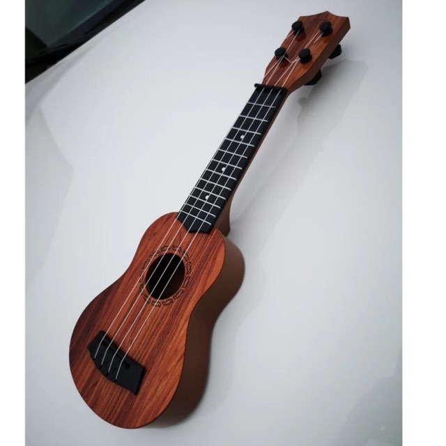 Đàn Ukulele Guitar Mini Đa Màu Sắc Kích Thích Sự Vui Chơi Của Bé Với Âm Nhạc, Đồ Chơi Bổ Ích Cho Bé Yêu Sóc_toystore