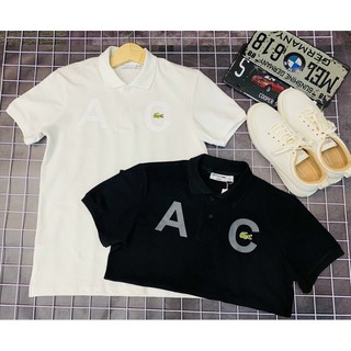 Áo thun polo cá sấu trắng và đen