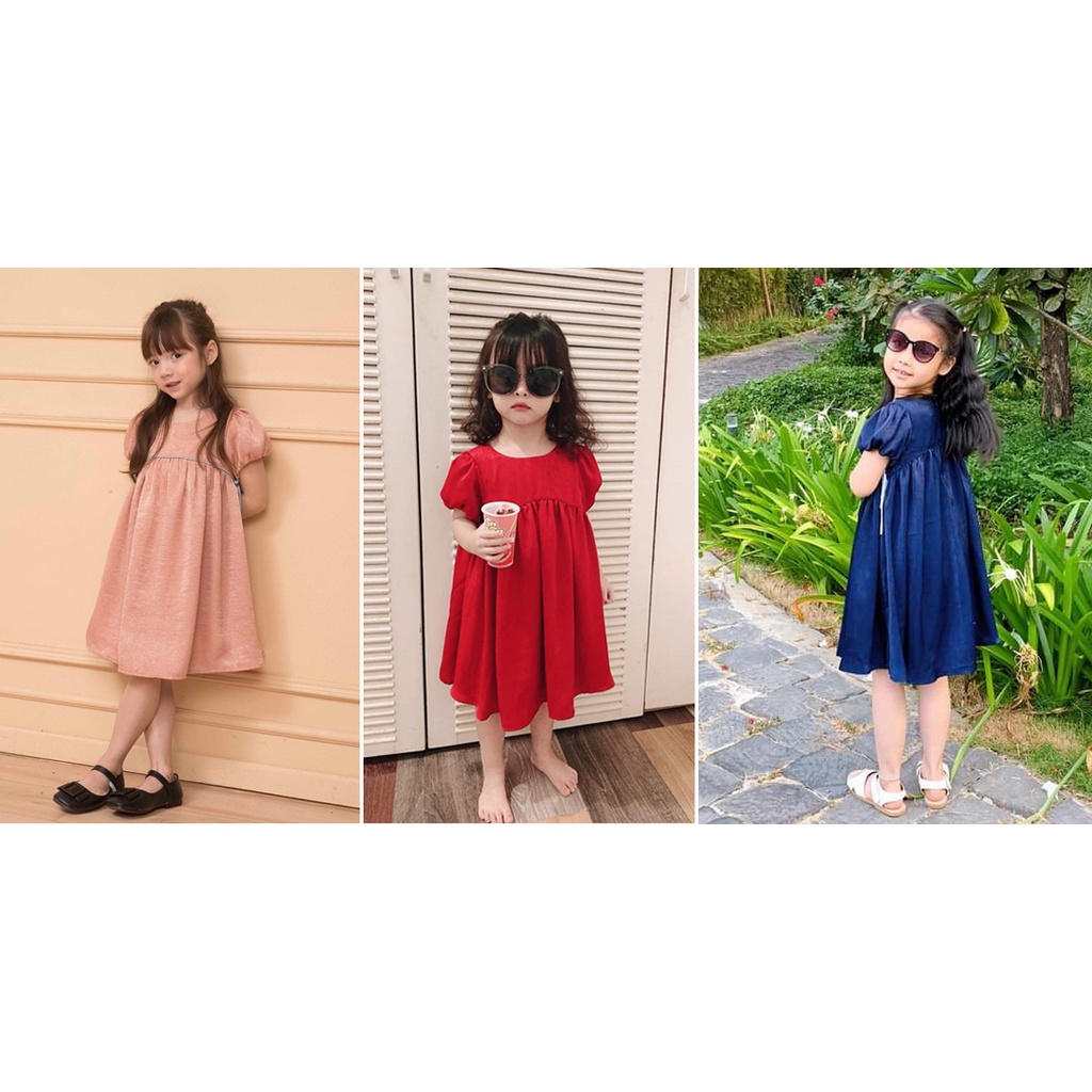 Đầm babydoll tay phồng chất liệu lụa bóng cho bé