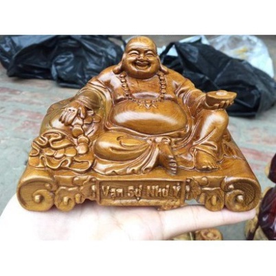 Tượng Phật di lặc để xe ô tô