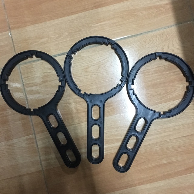 Tay vặn mở cốc lọc thô