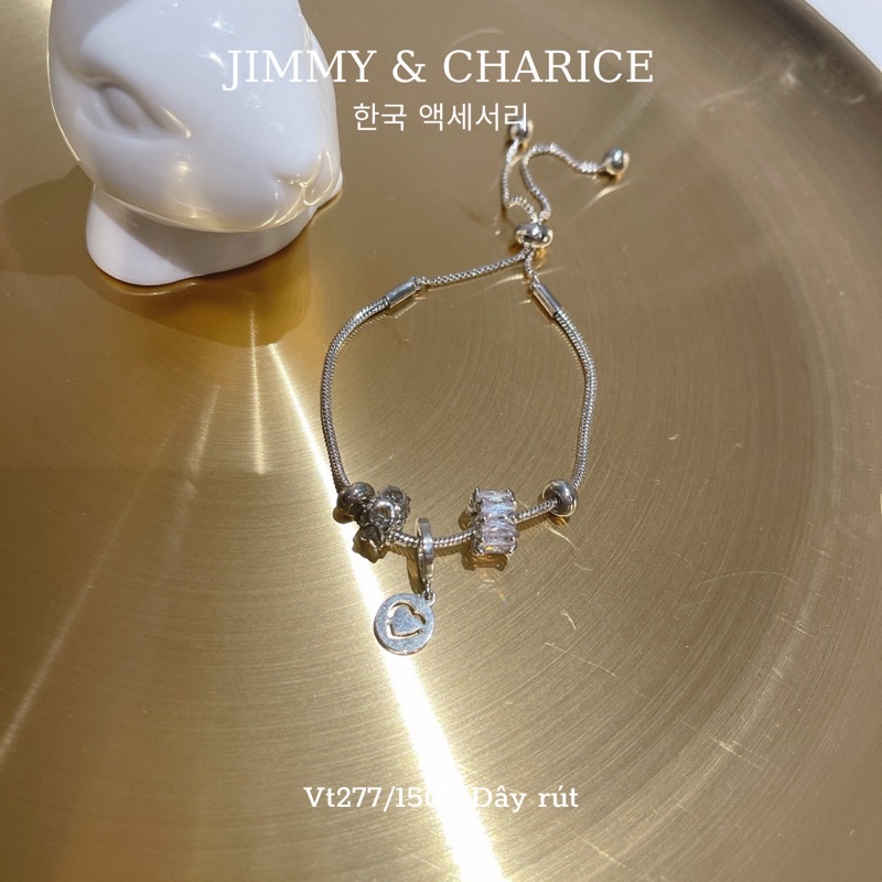 Lắc tay charm Jimmy & Charice dây rút 2 màu | BigBuy360 - bigbuy360.vn