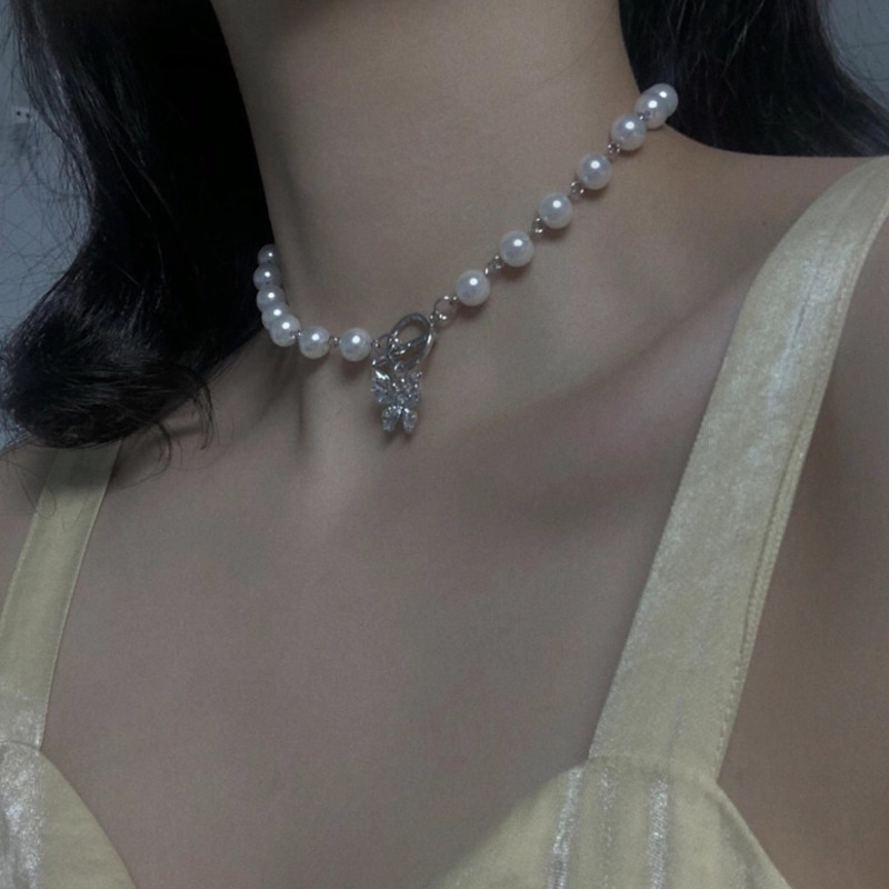 Vòng cổ ngọc trai mặt bướm nghệ thuật thời trang