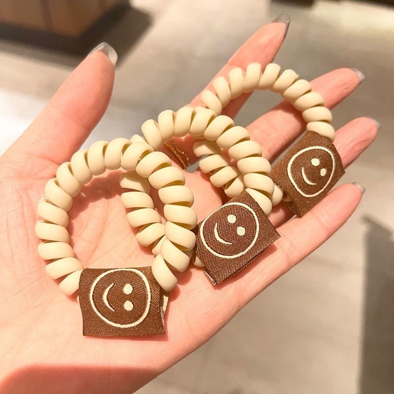 Dây buộc tóc cao su kiểu đường dây điện thoại với mặt cười thời trang phong cách Hàn Quốc dành cho nữ