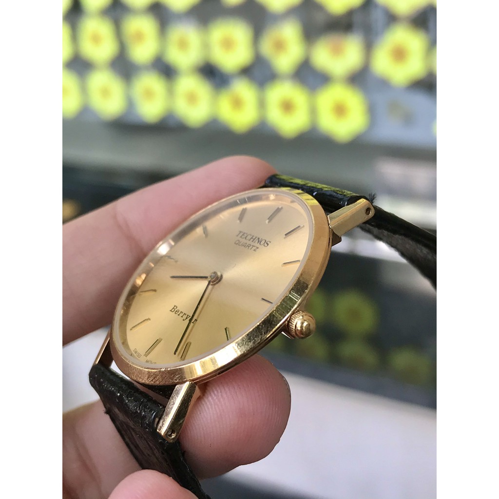 Đồng hồ nữ Technos mặt mỏng vàng dây da