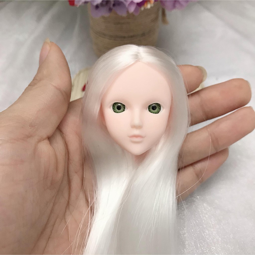 Đầu xinyi mắt gắn chưa faceup có tóc