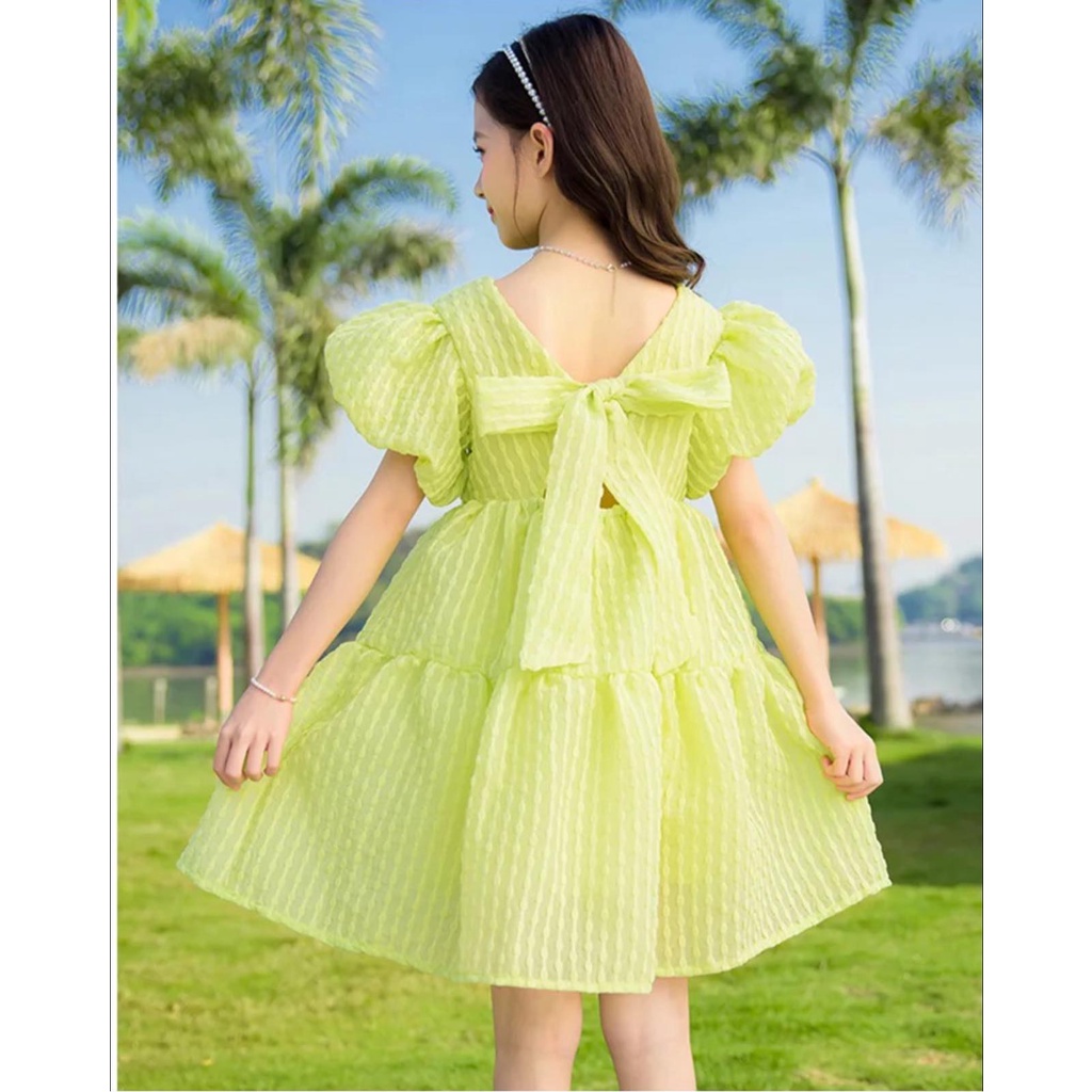 Đầm tay bồng màu xanh cốm nơ sau lưng cho bé gái