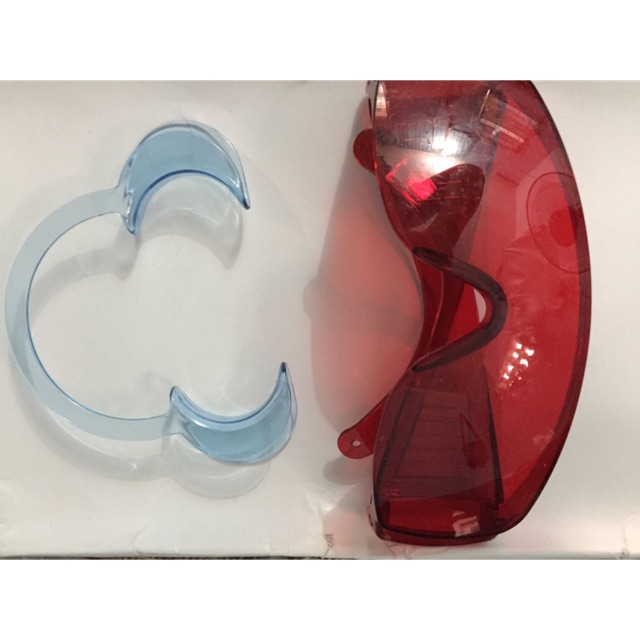 Kính đỏ che mắt khi làm trắng răng , bắn laze