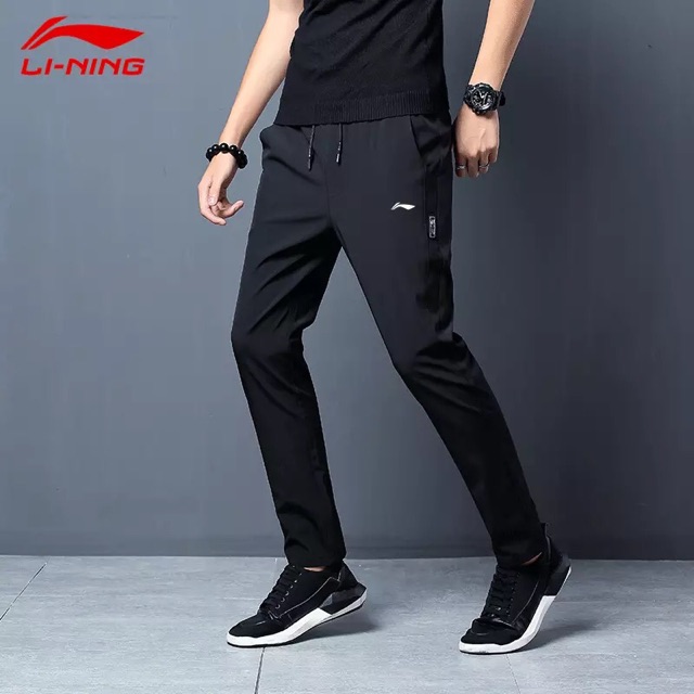 Quần gió lining nam