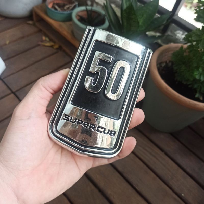 Mặt nạ và logo cub 81 50cc