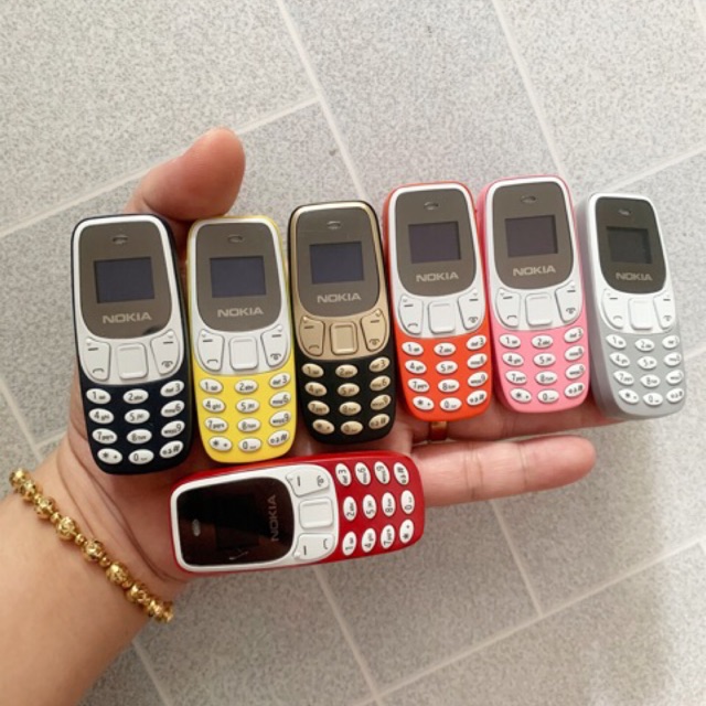 Điện thoại mini 2 sim siêu dễ thương 7 màu : vàng, đỏ, cam, xanh, xám, hồng, đen