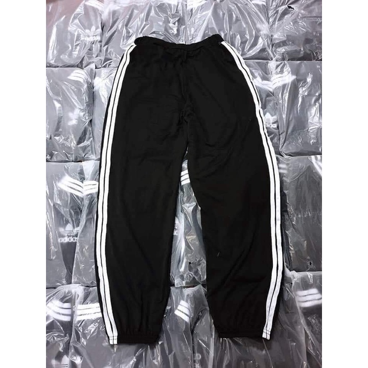 ￼Quần Jogger Rút Ống Viền 3 Sọc Unisex 2 Màu Đen Trắng