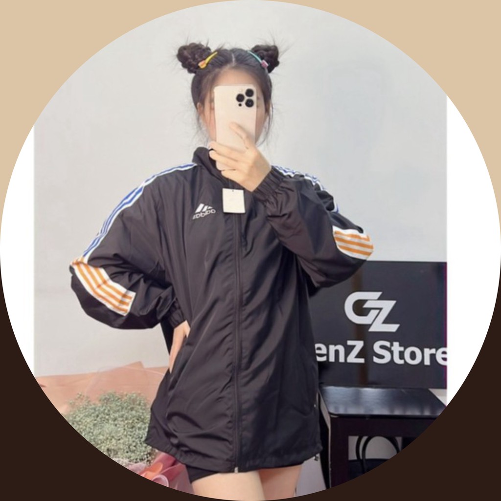 Áo khoác gió Adidas nam nữ 2 lớp trơn sọc trắng cam 3 phối màu GZAK021