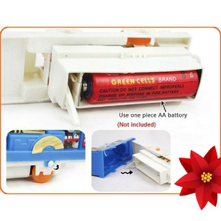 Đồ chơi xe lửa chạy trên đường ray