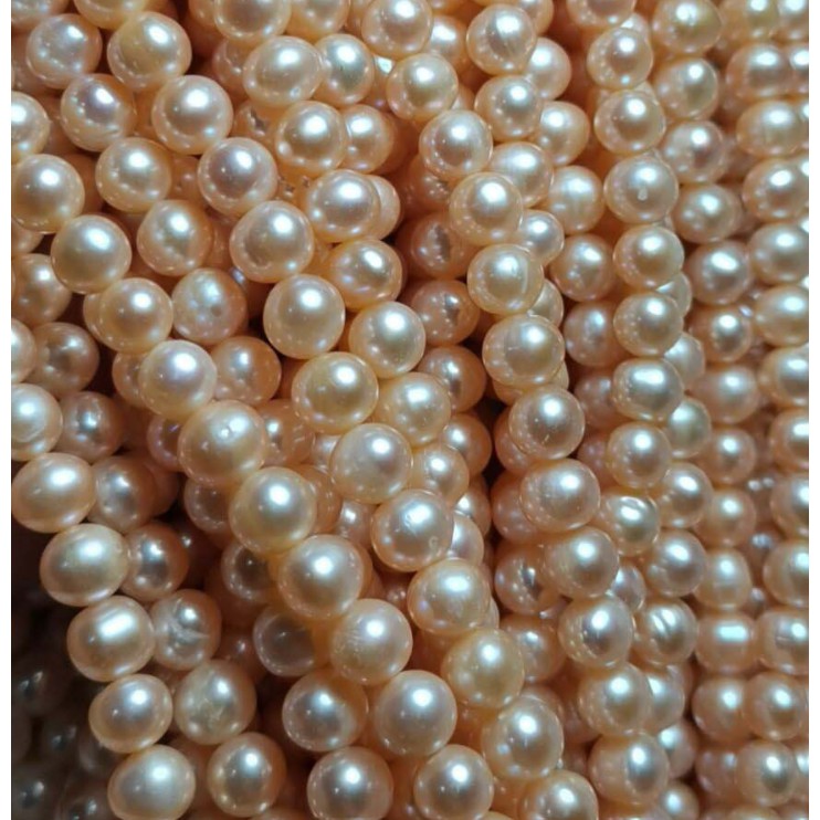 Dây nguyên liệu màu hồng cam 6-7mm gần tròn độ sáng 3A