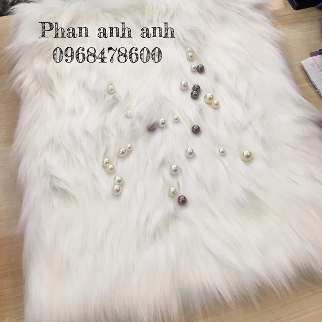 Thảm lông thú trắng lông dài hồ ly