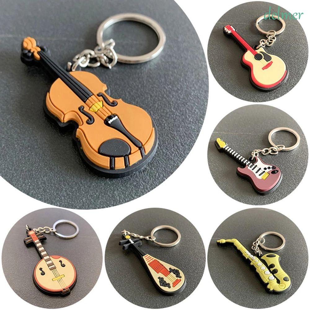 Móc khóa hình cây đàn piano đàn guitar bằng silicon cho nam và nữ