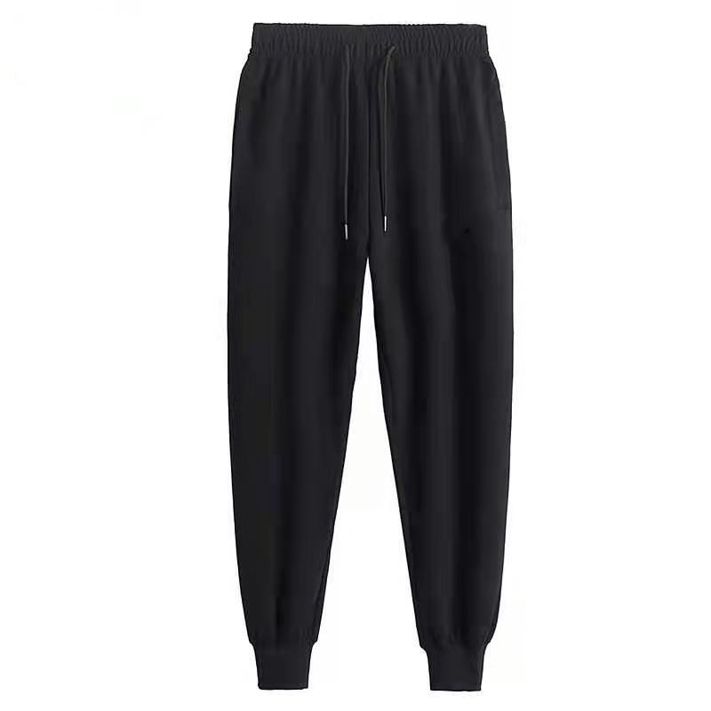 Quần thể thao dáng rộng phối túi màu đen phong cách Hàn Quốc thời trang xuân thu cho nam size S-5Xl