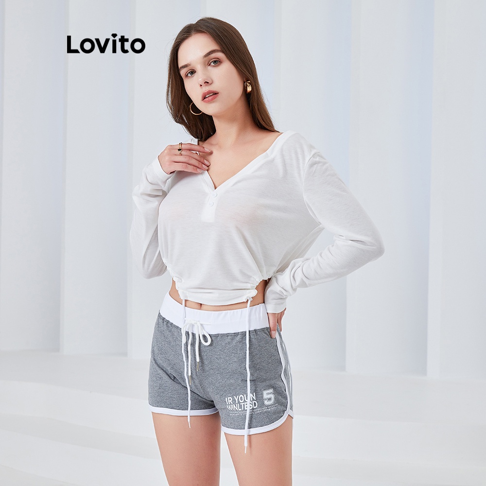 Quần ngắn thể thao Lovito L04093 lưng vừa dáng ôm in chữ phối dây rút màu xanh thời trang