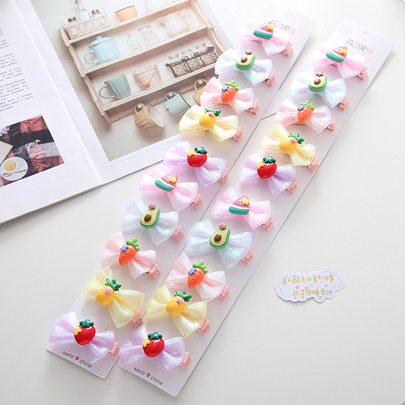 Kẹp tóc cho bé kiểu nơ hoạt hình