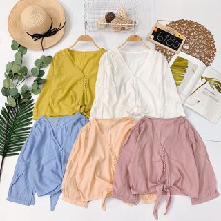 Áo nút bọc cột nơ eo