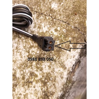 cục sạc máy cạo râu Panasonic.