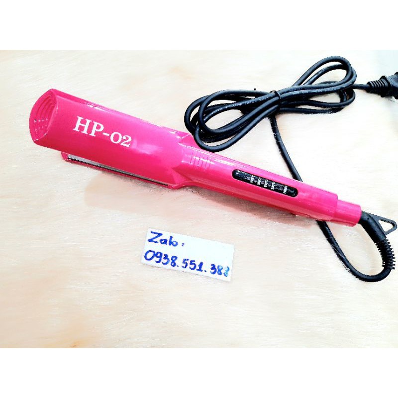 Máy kẹp HP-02 với thiết kế bản to giúp bạn kéo tóc dễ dàng, độ bền cao chuyên dụng cho salon và tại nhà.