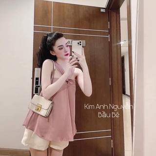 Set áo lụa hồng cổ chéo quần sooc trắng hothit