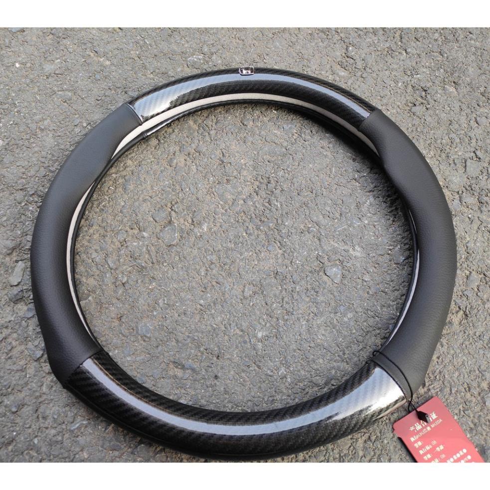 Bọc Vô Lăng Mitsubishi xpander outlander pajero sport triton attrage jolie chất liệu da vân cacbon size 38cm