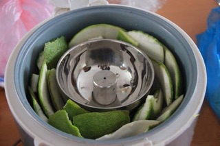 Tinh dầu bưởi và dầu gội bưởi ( 2 chai )