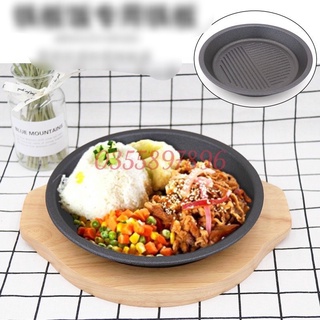 Chảo, vỉ gang đen kèm đế gỗ dùng bò bít tết nướng thịt, chiên cơm