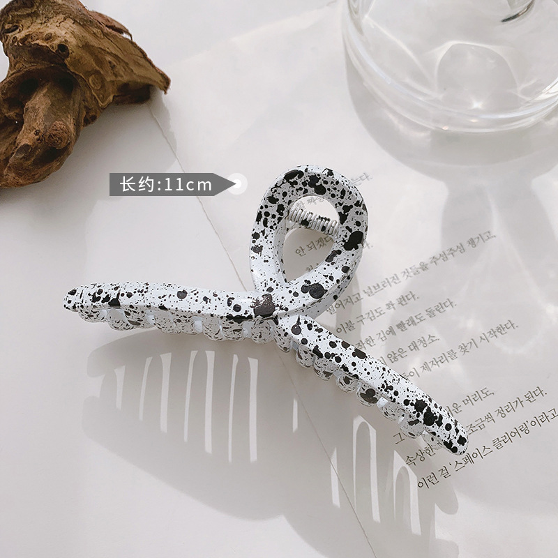 Kẹp tóc hình bò sữa trắng đen phong cách Hàn Quốc