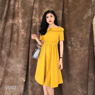 Váy vàng đi biển