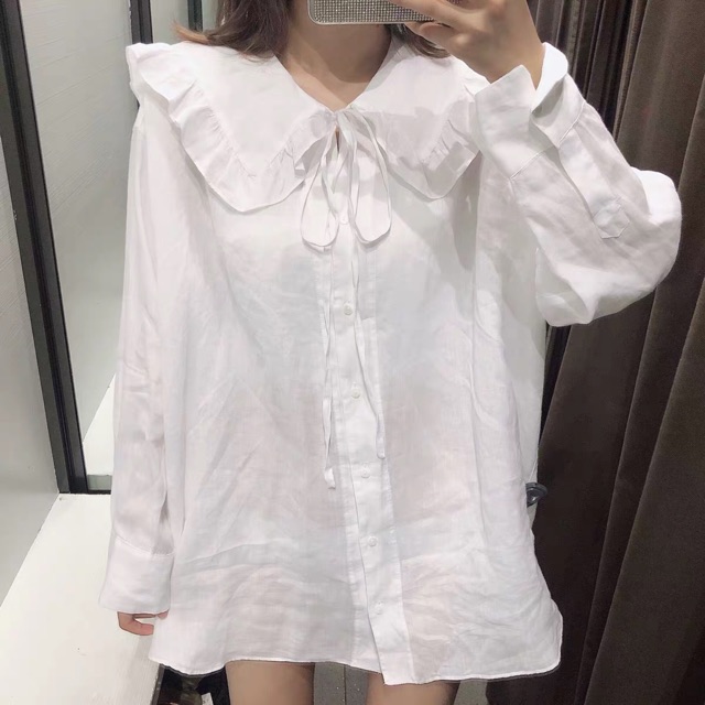 Áo sơ mi cổ sen to