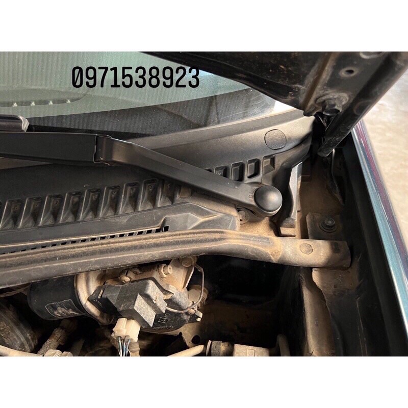 NẮP ĐẬY CẦN GẠT MƯA FORD LASER, MAZDA 232