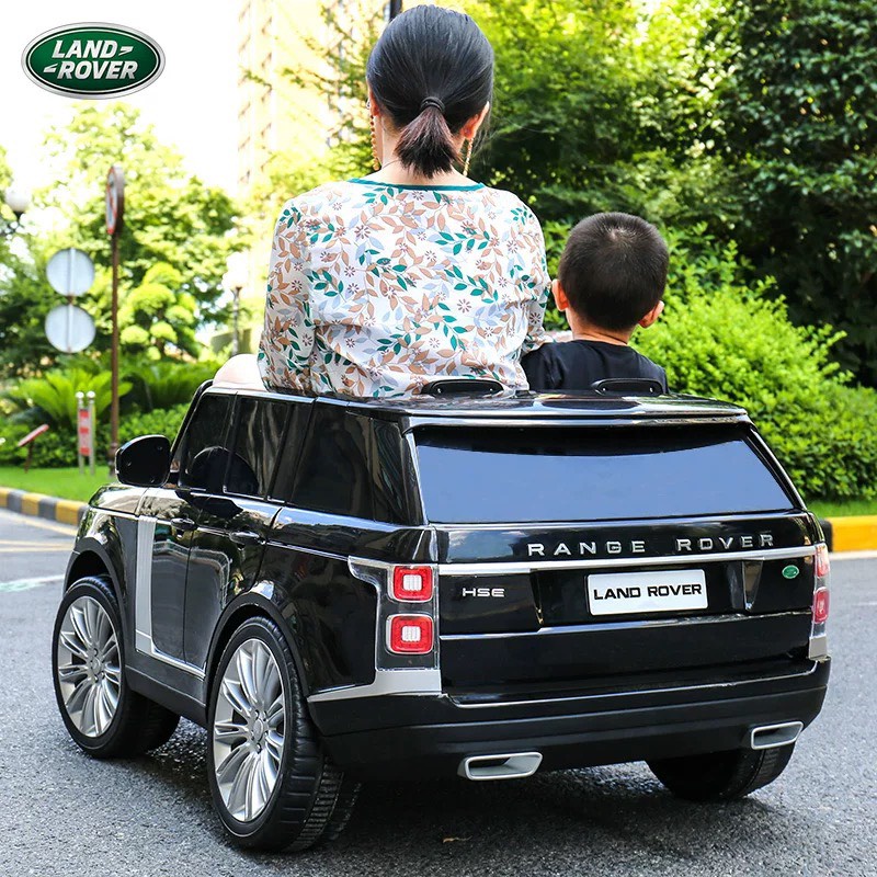 Ô tô xe điện trẻ em LAND ROVER 2 chỗ bánh cao su, ghế da, sơn tĩnh điện màn hình MP4 (Đỏ-Trắng-Đen-Xanh)