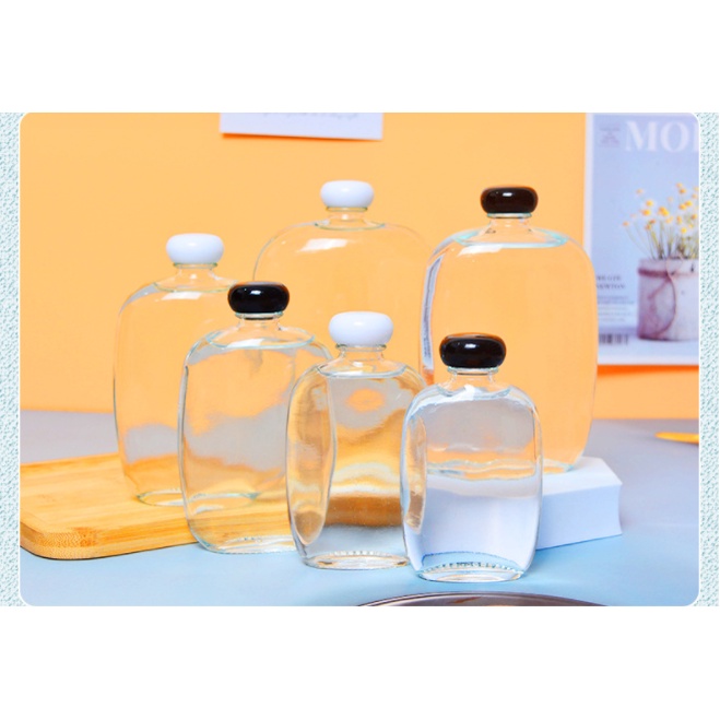 Chai Thuỷ Tinh Dẹp Bầu Nắp Nhựa Đen 250ml 350ml 500ml
