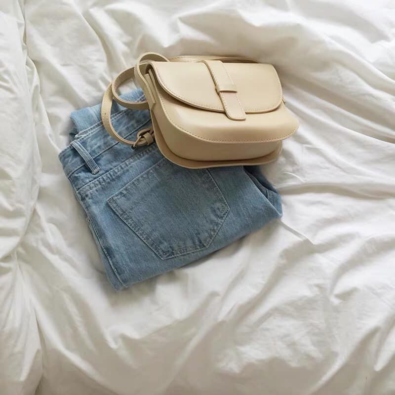 Túi bầu khuy, chất cực thích, dáng xinh dễ phối đồ