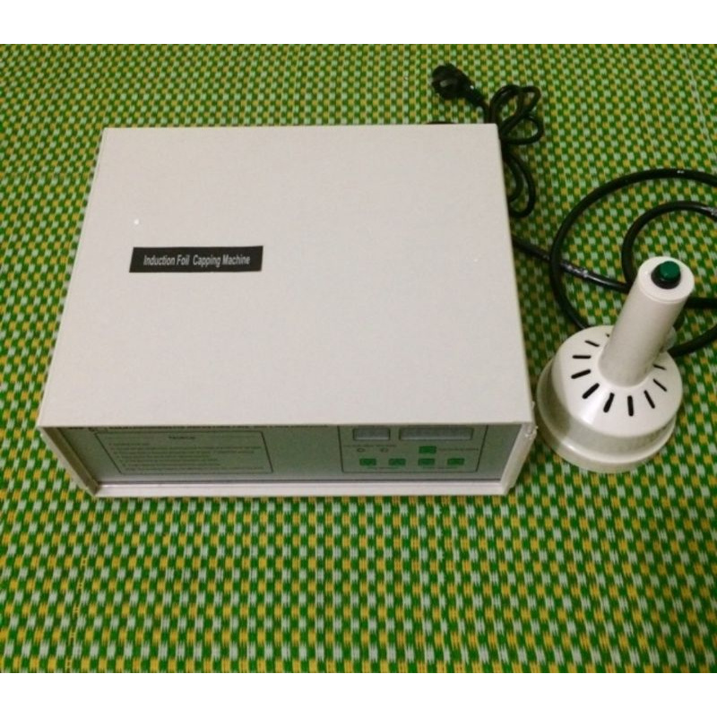 Máy dán màng seal