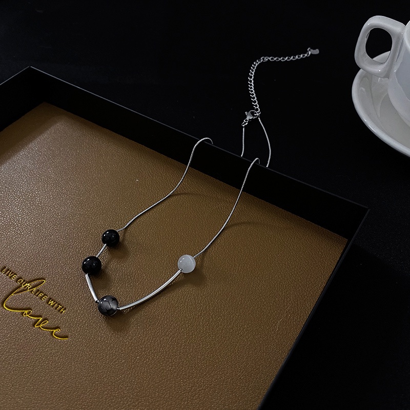 Dây chuyền chuỗi hạt tròn màu đen phong cách cổ điển