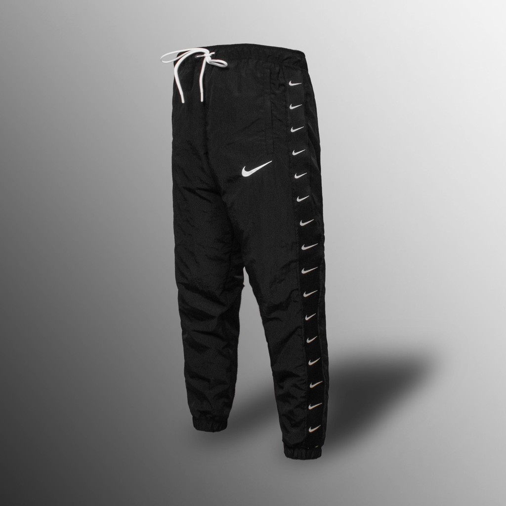 QUẦN DÀI NIKE SWOOSH TAPED SWOOSH POPOVER PANTS - ĐEN /TRẮNG