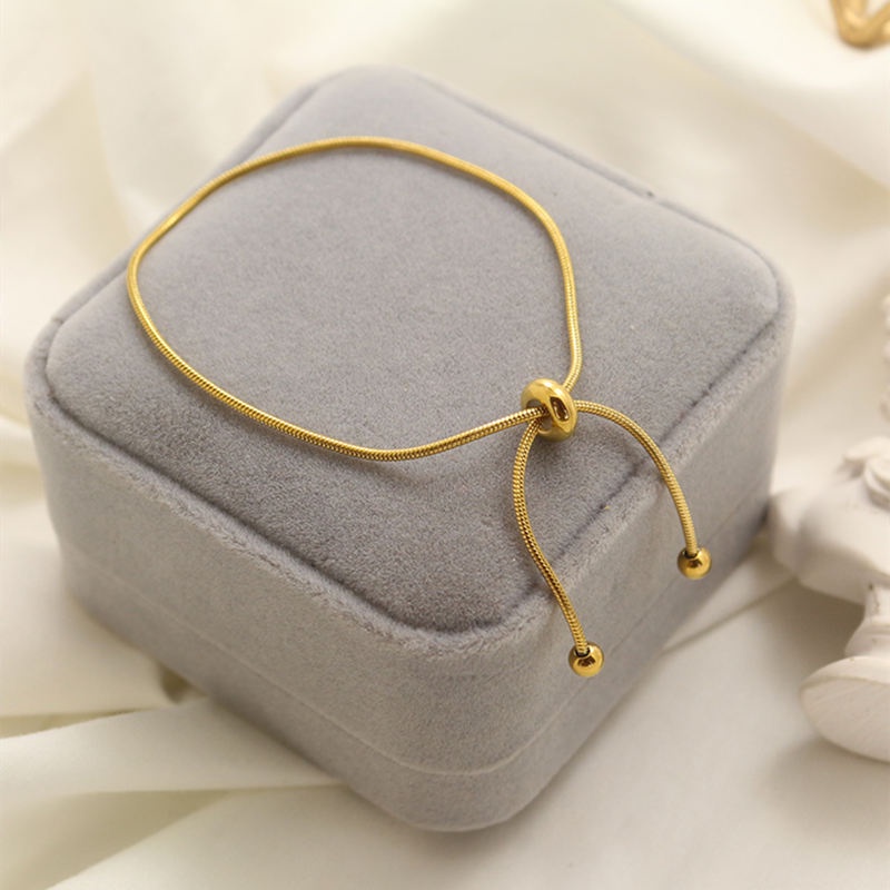 Lắc tay titan nữ 100% TITAN NGUYÊN CHẤT KHÔNG GỈ vòng tay vàng thiết kế đơn giản kiểu dáng rút sợi thời trang 2021