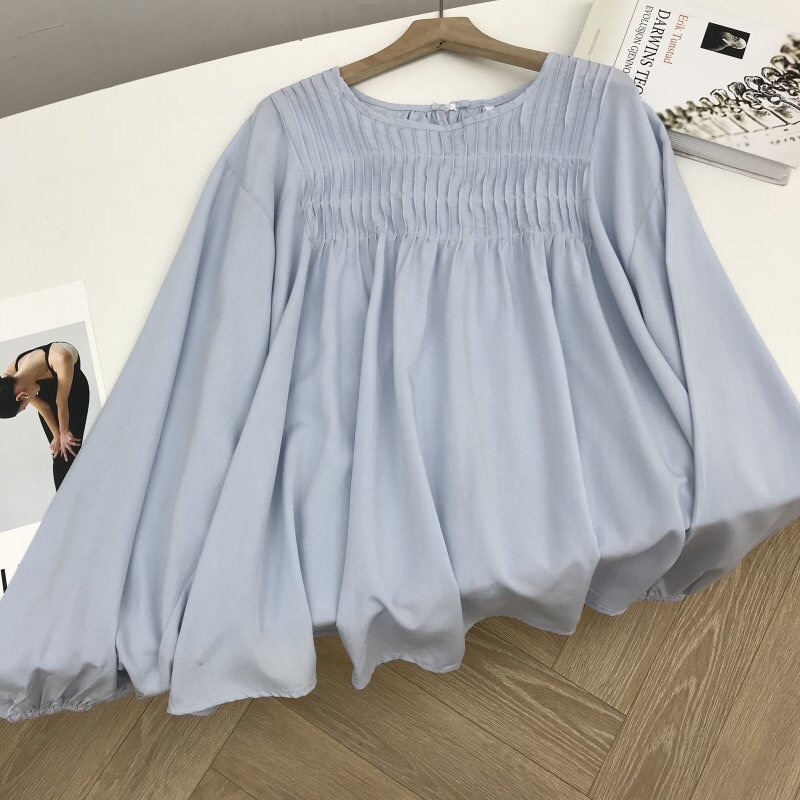 Áo sơ mi xanh pastel