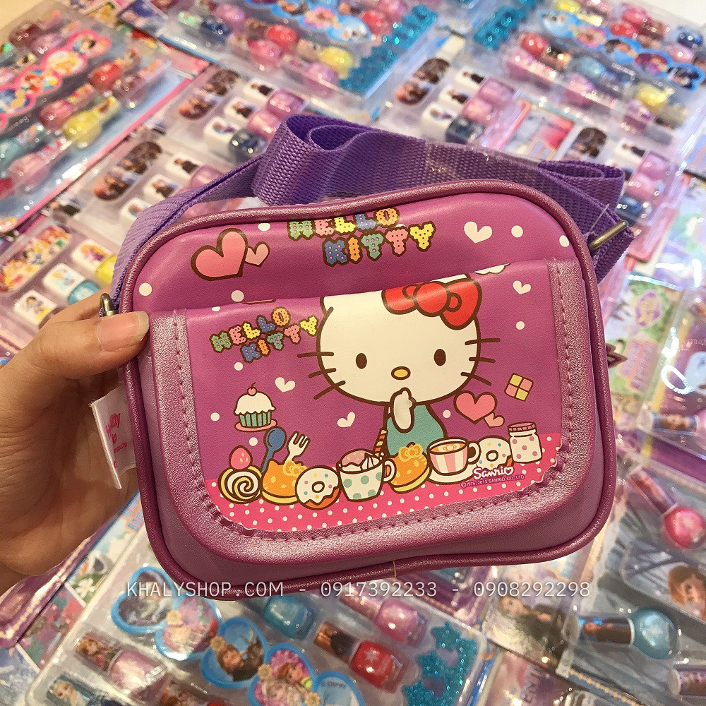 Túi đeo chéo 2 ngăn hình Mèo Hello Kitty bánh kem màu tím cho bé gái (Thái Lan) - 2506KT02502 - (14x4x11cm)