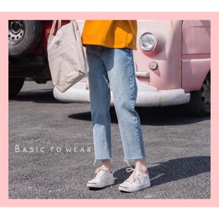 Quần jeans ống tua rua