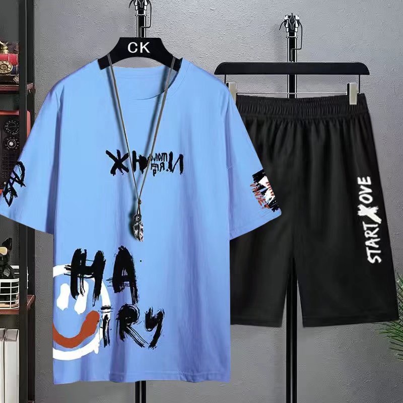 Thời trang mùa hè áo thun nam + quần short suit phiên bản Hàn Quốc xu hướng thể thao rời in áo thun cặp đôi xu hướng in quần short Áo thun hai mảnh Bộ đồ